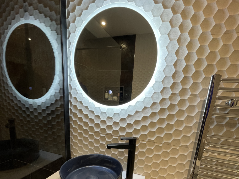 Custom made bathroom with a backlit mirror